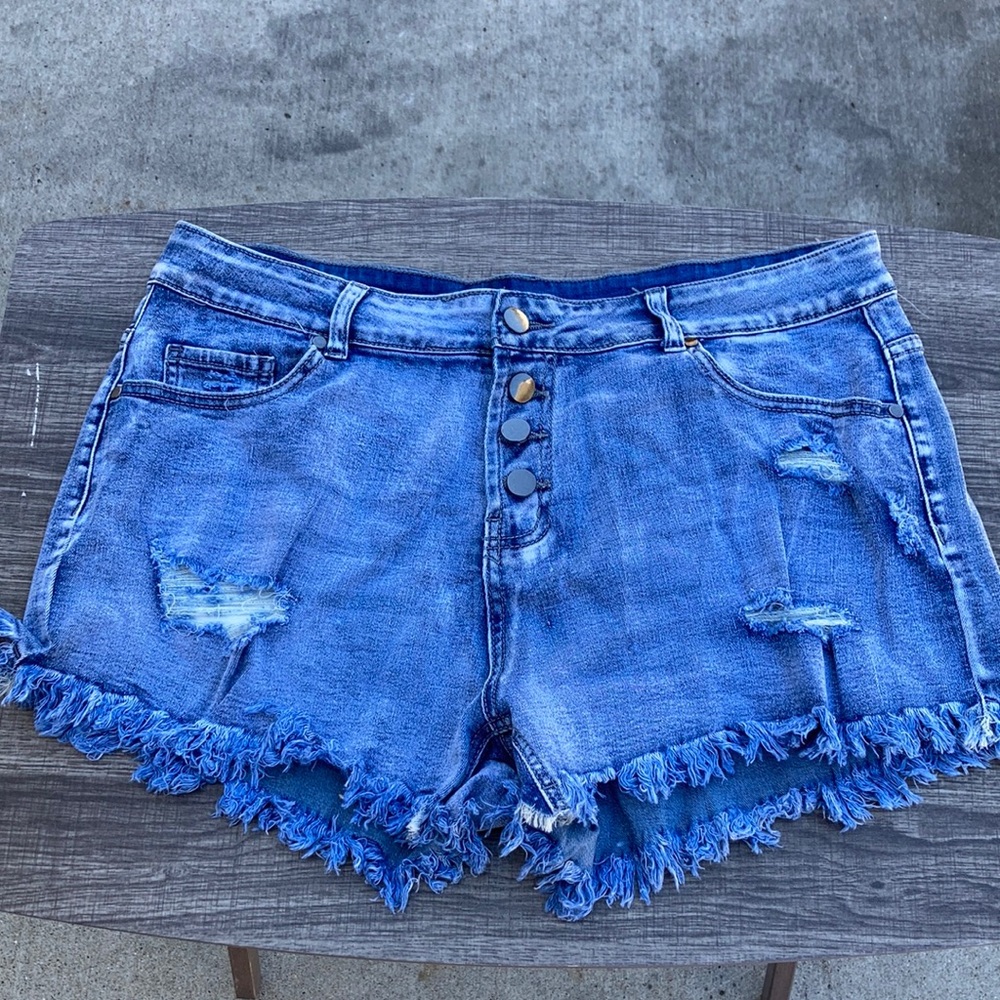 Distressed denim shorts